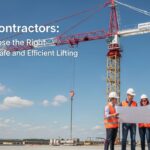 Crane contractors lifting heavy construction materials at a commercial job site